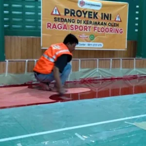 Pengerjaan Lapangan Badminton